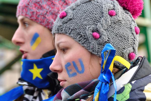 People wearing Ukraine and EU flag symbols